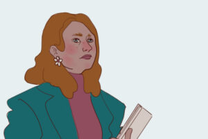 Una manager bionda con gli orecchini a margherita.